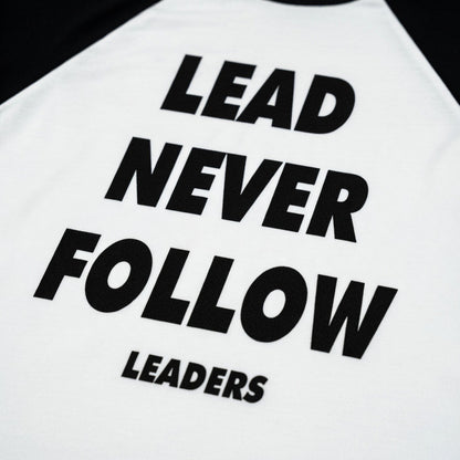 LEAD NEVER FOLLOW LEADERS TEE